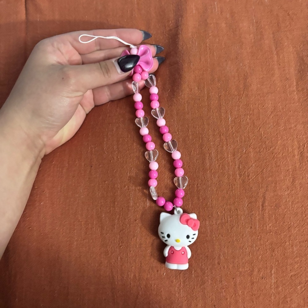 NWT Sanrio Hello Kitty Bow Phone Wristlet Pink - Picture 2 of 9